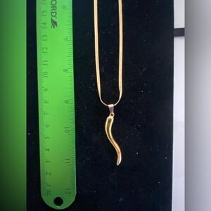 Elegant Gold Pendant Necklace Italian Horn pendant, also known as a Cornicello